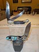 Two(2) large folding knives...