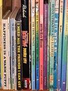 Bookcase and great grouping of children's books. Bookcase is 21.25 X 10.75 x 28.25 in tall. See all photos for titles.