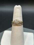 Unmarked 1-piece wedding ring set…..could not find any markings to indicate gold value…size 5-3/4