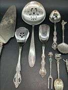 Selection of mismatched silverplate/stainless flatware pieces