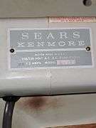 Vintage Sears Kenmore sewing machine in cabinet with storage chair. Closed cabinet is 22.5x18 X 30 in tall. Chair is 16 X 13 X 27.5 in tall. Seat height is 17 in