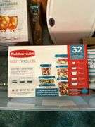 Tote full of miscellaneous household/kitchen items…..Food Network stemware, partial box of Rubbermaid storage containers, cutting boards and more