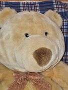 Commonwealth tan teddy bear with bowtie.