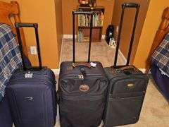 Three rolling luggage pieces. CastleNuovo is 20 in, AF is 22, Ricardo Beverly hills is 21. CastleNuevo and AF are expandable..