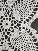 Framed hand crocheted doily. 13 x 13 in