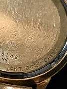 Men's Bulova watch with 14 karat gold case. Watch is not working.