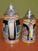 2 steins. One is 7.25 in from West Germany,  8.25 in is from Germany