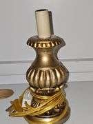 17-in shallow bowl, 8 in tall gold lamp with no shade, 11 in gold planter.