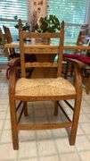 Exquisite custom built table and chairs……custom built in 1972 in Nicosia, Cyprus from oak(?). There are no nails except on the chairs to hold the rush seating in place. Chairs are hand carved…..one small blemish on table top