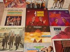 Grouping of albums by The lettermen The Brothers Four, Smothers Brothers, the Kingston Trio, and Charlie Byrd.