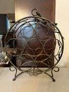 Unbranded Countertop Wine Bottle Rack with grape leaf side design…..13-1/2”D x 17-1/4” tall