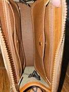 Dooney & Bourke handbag with shoulder strap.