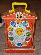 Vintage Fisher-Price toys. Snoopy and teaching clock in working order. Sparkling symphony star sticker needs batteries.