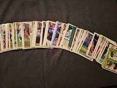 A grouping of football cards from the 1970s, sorted by teams.  See additional information and all photos.