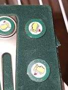 Masters divot tool and ball marker set.
