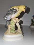 Lefton China goldfinch, unmarked bluebird, and terracotta look rabbit.