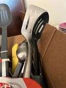 Box of kitchen utensils……knives, spoons, spatulas, corer and more…..there is a new calphalon slotted and new carving set (see pics)