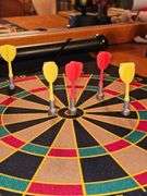 Magnetic dart board (missing 1 red dart), bobblehead Einstein needs battery, and mini Disco light works.