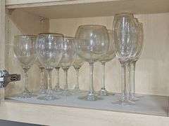 Cabinet of stemware. Matching set of 11 iced beverages, 11 wine glasses, 12 coupe champagne glasses. Matching set of 8 "H" monogrammed glasses, four shrimp cocktail stems with liners and more. See all photos.