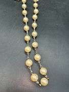 Adjustable waist size iridescent pearl-like beaded belt with charms
