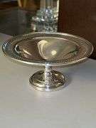 Very nice selection of silverplate items……compote, 2 small bowls, medium-sized bowl, rose bowl(?), and round serving tray