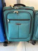 (4) pieces of various size luggage…..1 piece is NEW with tags