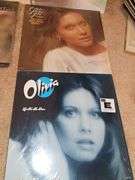 Grouping of albums including Gordon Lightfoot, Fleetwood Mac, Helen Reddy, Joan Baez, and Olivia Newton-John.