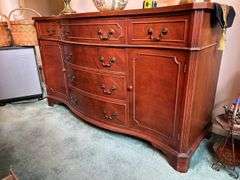 Beautiful vintage mahogany buffet with 6 drawers and 2 side compartments……62 x 21-3/4 x 36 tall….has slight blemishes from every day use….this piece is at least 80 years old and is a family heirloom