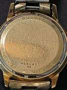 Men's Bulova watch with 14 karat gold case. Watch is not working.