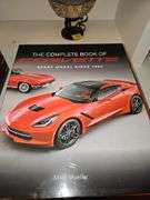 Grouping of Corvette books. Top three are soft cover, the rest are hardback.