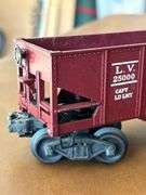 Selection of (2) Lionel Train Cars…..Baby Ruth car needs repair