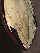 Silver plated ice scoop with "H" monogram
