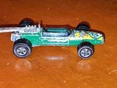 Vintage Hot wheel carrying case and cars as shown. One redline wheel in this grouping. Dukes of Hazzard car is Ertl.