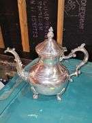 Tub of silver plate items. Two teapots, heated coffee pot, covered sugar, and creamer.