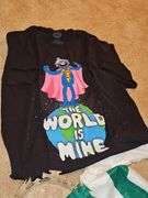 Miscellaneous grouping. Super Grover t-shirt,pink apron, Mardi gras style masks, beads, polar bear hat, and more.