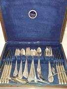 William Rogers silver plate Remembrance pattern flatware. Six piece place setting service for eight (missing two soup spoons) 8 serving pieces. Includes chest.