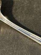 International Sterling Enchantress Serving Spoon…..64 grams