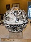 Gorgeous 9x9 intricately carved American Indian round vase...