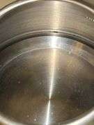 Stainless tea kettle and NEW Cuisinart white enamel tea kettle….no dents