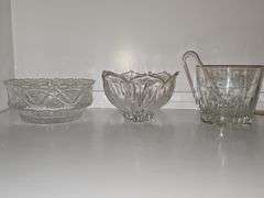 8.5 in crystal bowl, 7.5 in crystal lotus bowl, 6-in crystal ice bucket with tongs.