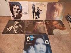 Grouping of albums including Gordon Lightfoot, Fleetwood Mac, Helen Reddy, Joan Baez, and Olivia Newton-John.