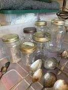 Selection of various silverplate flatware (mostly Community plate and needs polished), canning jar and vintage handheld mixer