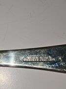 Silver plate salad servers cold meat fork and serving spoon.
