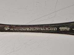 Silver plate salad servers cold meat fork and serving spoon.