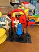 Table full of vintage toys…..Tuggy Tooter does still work, wooden puzzles, Jack-In-The-Box turns but no music nor does he pop out, wooden blocks and more