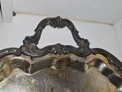Footed oblong silver plate tray. 25x14.5 in