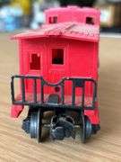 Lionel Trains Red Plastic Caboose…..needs cleaned from being stored in attic
