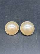 Great selection of vintage screw-back and clip-on earrings, along with a cylindrical gold tone brooch