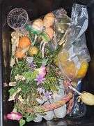 Two containers of decorative Easter items.