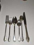 William Rogers silver plate Remembrance pattern flatware. Six piece place setting service for eight (missing two soup spoons) 8 serving pieces. Includes chest.
